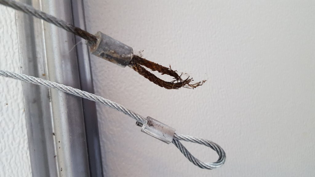 garage door broken cables repair